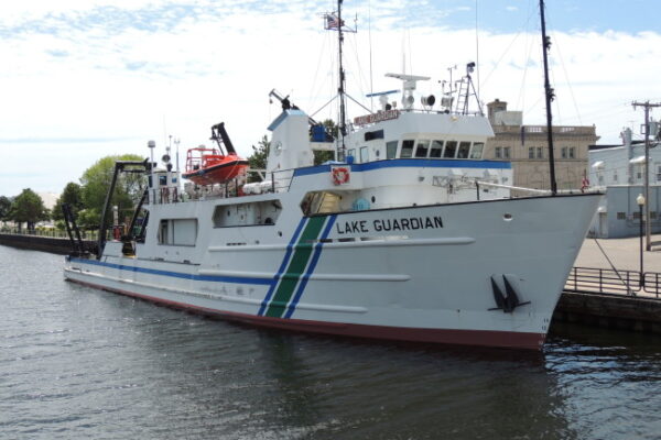 a couple of boats in a harbor