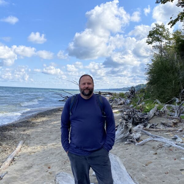 a man standing on a beach